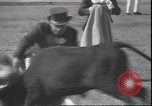 Image of Spanish comedians provoke bull Los Angeles California USA, 1935, second 28 stock footage video 65675058964