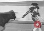 Image of Spanish comedians provoke bull Los Angeles California USA, 1935, second 31 stock footage video 65675058964