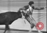 Image of Spanish comedians provoke bull Los Angeles California USA, 1935, second 32 stock footage video 65675058964