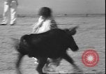 Image of Spanish comedians provoke bull Los Angeles California USA, 1935, second 44 stock footage video 65675058964
