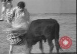 Image of Spanish comedians provoke bull Los Angeles California USA, 1935, second 46 stock footage video 65675058964