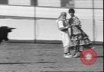 Image of Spanish comedians provoke bull Los Angeles California USA, 1935, second 56 stock footage video 65675058964