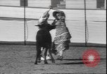Image of Spanish comedians provoke bull Los Angeles California USA, 1935, second 60 stock footage video 65675058964