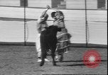 Image of Spanish comedians provoke bull Los Angeles California USA, 1935, second 61 stock footage video 65675058964