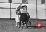 Image of Spanish comedians provoke bull Los Angeles California USA, 1935, second 62 stock footage video 65675058964