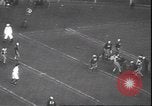 Standbild Football Game Philadelphia Pennsylvania USA, 1940, aus Sekunde 36 historischem Filmmaterial Videoclip 65675059027