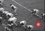 Standbild Football Game Philadelphia Pennsylvania USA, 1940, aus Sekunde 56 historischem Filmmaterial Videoclip 65675059027