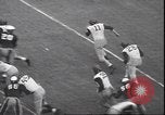 Standbild Football Game Philadelphia Pennsylvania USA, 1940, aus Sekunde 58 historischem Filmmaterial Videoclip 65675059027