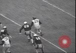 Standbild Football Game Philadelphia Pennsylvania USA, 1940, aus Sekunde 59 historischem Filmmaterial Videoclip 65675059027