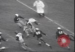 Standbild Football Game Philadelphia Pennsylvania USA, 1940, aus Sekunde 60 historischem Filmmaterial Videoclip 65675059027
