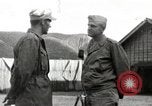 Image of American medical officer Honshu Japan, 1945, second 11 stock footage video 65675059130