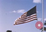 Image of United States flag at World War 2 cemetery Philippines, 1945, second 3 stock footage video 65675059142