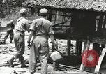 Standbild USA Soldaten New Guinea, 1944, aus Sekunde 9 historischem Filmmaterial Videoclip 65675059164