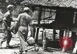Standbild USA Soldaten New Guinea, 1944, aus Sekunde 10 historischem Filmmaterial Videoclip 65675059164