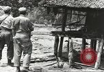 Standbild USA Soldaten New Guinea, 1944, aus Sekunde 13 historischem Filmmaterial Videoclip 65675059164