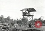 Standbild USA Soldaten New Guinea, 1944, aus Sekunde 57 historischem Filmmaterial Videoclip 65675059164