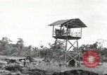 Standbild USA Soldaten New Guinea, 1944, aus Sekunde 58 historischem Filmmaterial Videoclip 65675059164