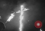 Image of Ku Klux Klan cross burning ceremony United States USA, 1930, second 16 stock footage video 65675059202
