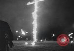 Image of Ku Klux Klan cross burning ceremony United States USA, 1930, second 20 stock footage video 65675059202