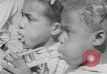 Standbild Afrikanische amerikanische Kinder trainieren und spielen Instrumente Alabama United States USA, 1940, aus Sekunde 41 historischem Filmmaterial Videoclip 65675059219