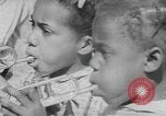 Standbild Afrikanische amerikanische Kinder trainieren und spielen Instrumente Alabama United States USA, 1940, aus Sekunde 44 historischem Filmmaterial Videoclip 65675059219
