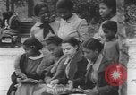 Immagine di African American Girls at play 1940s Alabama United States USA, 1940, secondo 39 filmato di repertorio 65675059220