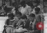 Immagine di African American Girls at play 1940s Alabama United States USA, 1940, secondo 42 filmato di repertorio 65675059220