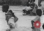 Immagine di African American Girls at play 1940s Alabama United States USA, 1940, secondo 51 filmato di repertorio 65675059220