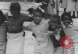 Immagine di African American Girls at play 1940s Alabama United States USA, 1940, secondo 56 filmato di repertorio 65675059220