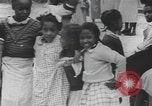 Immagine di African American Girls at play 1940s Alabama United States USA, 1940, secondo 57 filmato di repertorio 65675059220