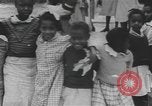 Immagine di African American Girls at play 1940s Alabama United States USA, 1940, secondo 58 filmato di repertorio 65675059220