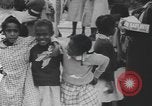 Immagine di African American Girls at play 1940s Alabama United States USA, 1940, secondo 61 filmato di repertorio 65675059220