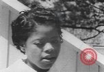 Standbild Afrikanische amerikanische Volk Picknick United States USA, 1940, aus Sekunde 19 historischem Filmmaterial Videoclip 65675059224