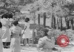 Standbild Afrikanische amerikanische Volk Picknick United States USA, 1940, aus Sekunde 29 historischem Filmmaterial Videoclip 65675059224