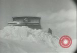 Image of blizzard Canada, 1943, second 18 stock footage video 65675059294