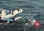 Image of United States Navy SOC Seagull hoisted aboard battleship Newfoundland, 1942, second 18 stock footage video 65675059322