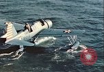 Image of United States Navy SOC Seagull hoisted aboard battleship Newfoundland, 1942, second 19 stock footage video 65675059322
