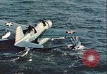 Image of United States Navy SOC Seagull hoisted aboard battleship Newfoundland, 1942, second 20 stock footage video 65675059322