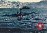 Image of United States Navy SOC Seagull hoisted aboard battleship Newfoundland, 1942, second 22 stock footage video 65675059322