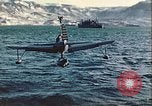 Image of United States Navy SOC Seagull hoisted aboard battleship Newfoundland, 1942, second 23 stock footage video 65675059322
