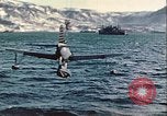 Image of United States Navy SOC Seagull hoisted aboard battleship Newfoundland, 1942, second 25 stock footage video 65675059322