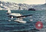 Image of United States Navy SOC Seagull hoisted aboard battleship Newfoundland, 1942, second 27 stock footage video 65675059322
