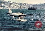Image of United States Navy SOC Seagull hoisted aboard battleship Newfoundland, 1942, second 28 stock footage video 65675059322