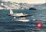 Image of United States Navy SOC Seagull hoisted aboard battleship Newfoundland, 1942, second 29 stock footage video 65675059322