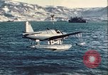 Image of United States Navy SOC Seagull hoisted aboard battleship Newfoundland, 1942, second 30 stock footage video 65675059322