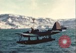 Image of United States Navy SOC Seagull hoisted aboard battleship Newfoundland, 1942, second 31 stock footage video 65675059322