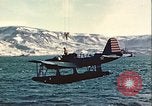 Image of United States Navy SOC Seagull hoisted aboard battleship Newfoundland, 1942, second 32 stock footage video 65675059322