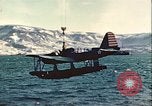 Image of United States Navy SOC Seagull hoisted aboard battleship Newfoundland, 1942, second 33 stock footage video 65675059322