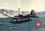 Image of United States Navy SOC Seagull hoisted aboard battleship Newfoundland, 1942, second 34 stock footage video 65675059322