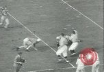 Standbild College-Football-Spiel New York United States USA, 1941, aus Sekunde 15 historischem Filmmaterial Videoclip 65675059334